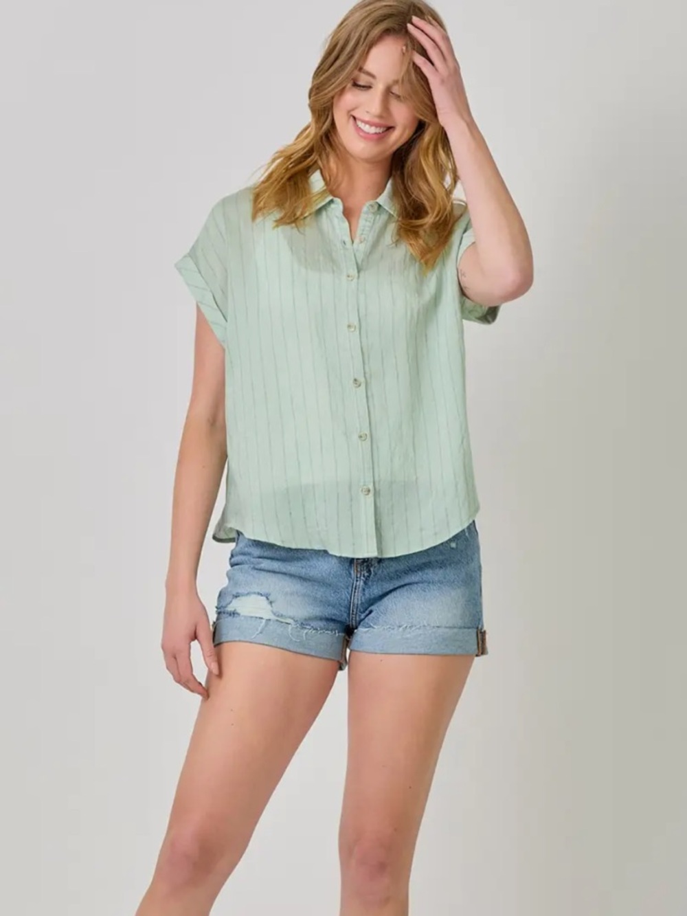 2006. Cuffed button down pin stripe flowy top in Lt green